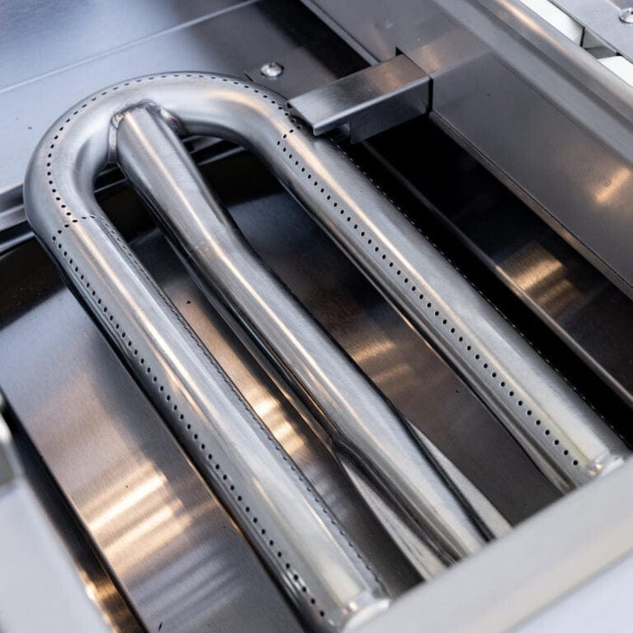 Close-up of stainless steel U-shaped grill burner designed for even heat distribution.