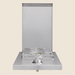Stainless steel outdoor single side burner with raised grate and protective back panel.