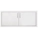 A wide stainless steel double-door access panel with brushed handles, ideal for outdoor kitchen or utility storage compartments.