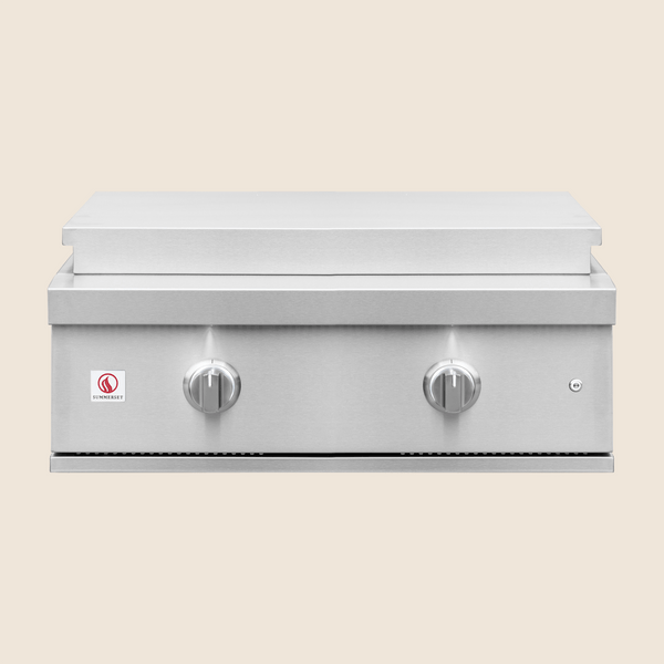 Stainless steel outdoor flat top griddle with two control knobs and a sleek modern design.
