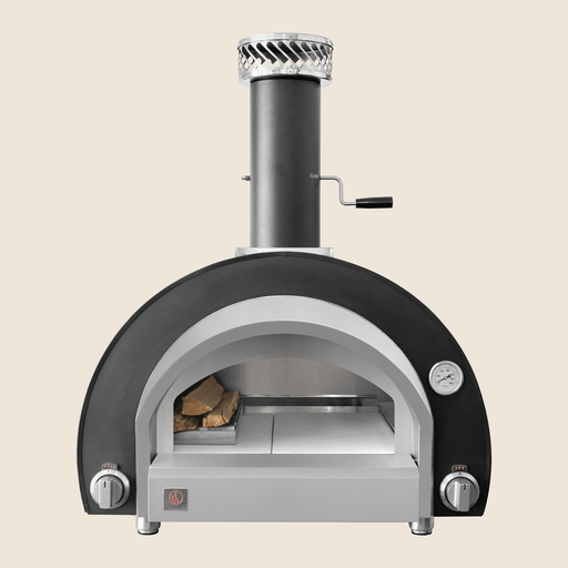Outdoor pizza oven with stainless steel finish, dual control knobs, built-in thermometer, and chimney vent.