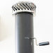 Close-up of outdoor pizza oven chimney with adjustable vent handle and stainless steel top cap.