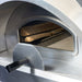 Close-up of stainless steel outdoor pizza oven showing firewood inside and partially open door handle.
