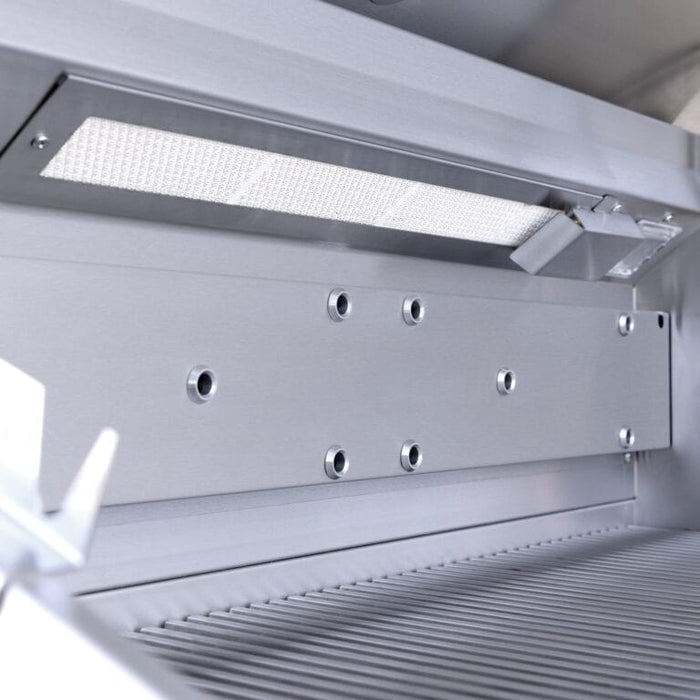 Close-up of stainless steel grill interior highlighting the infrared back burner and vented rear panel.