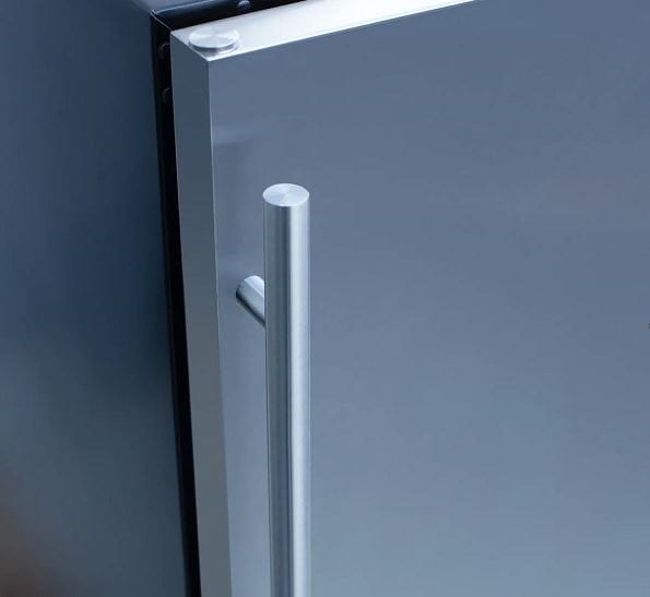 Close-up view of a stainless steel refrigerator door with a sleek, vertical handle and smooth metallic finish.