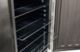 Close-up view of an open refrigerator showing adjustable wire shelves and a partially opened shelf, highlighting interior storage.