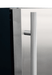 Close-up view of a stainless steel refrigerator door handle with a sleek, modern design, mounted on a reflective surface.