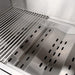 Close-up of a stainless steel grill interior, showing grates on the left and perforated heat distribution panels on the right.