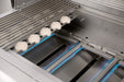 Stainless steel gas grill with ceramic briquettes and active blue flame burners for even heat distribution.