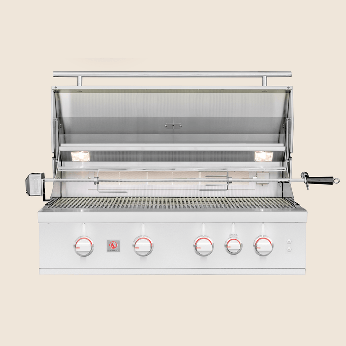 Stainless steel outdoor grill with rotisserie, illuminated cooking area, and control knobs with red LED lighting.