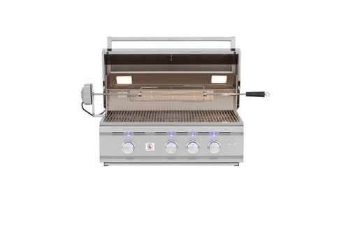 Stainless steel outdoor grill with an open lid, rotisserie attachment, illuminated cooking area, and four blue-lit control knobs.