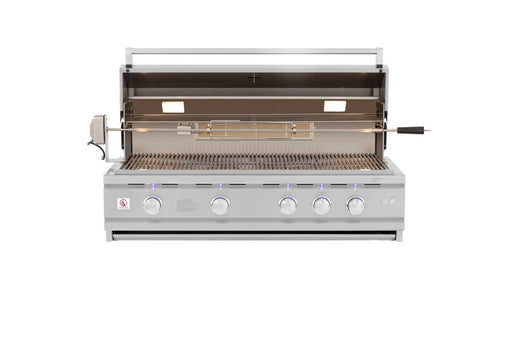 Stainless steel grill with open lid, rotisserie attachment, cooking grates, LED-lit control knobs, and interior lighting for visibility.