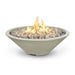 Cazo gas fire pit in white color made of GFRC concrete with a narrow ledge, filled with lava rocks and featuring a sleek, modern design with flames.