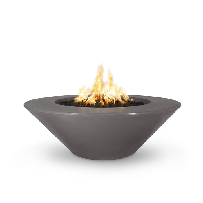 Cazo gas fire pit in chestnut color made of GFRC concrete with a wide ledge, filled with lava rocks and featuring a sleek, modern design with flames