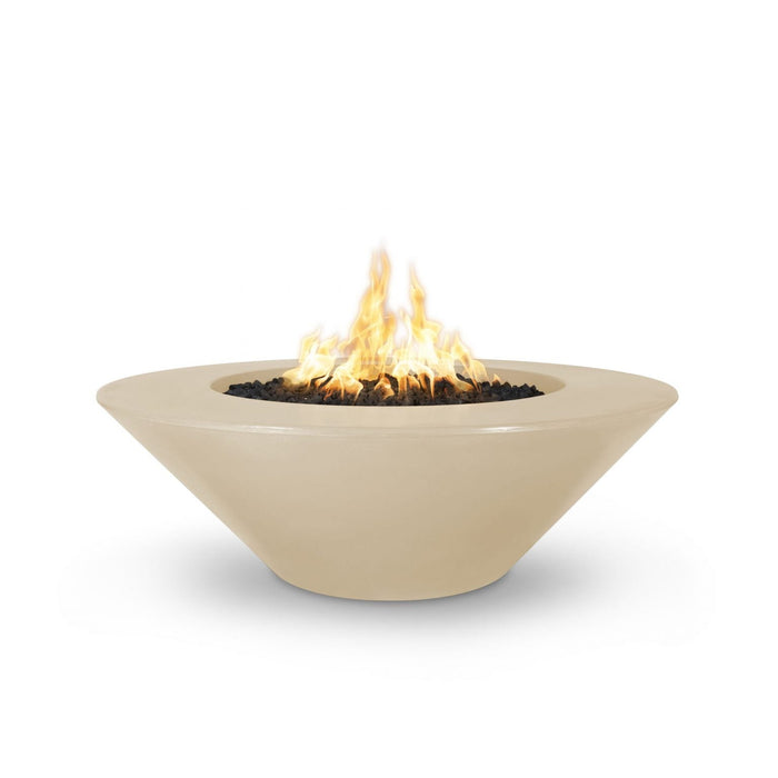 Cazo gas fire pit in vanilla color made of GFRC concrete with a wide ledge, filled with lava rocks and featuring a sleek, modern design with flames