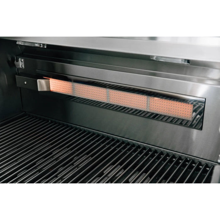 Glowing infrared rear burner on an American Made Grills Alturi built-in gas grill for rotisserie cooking