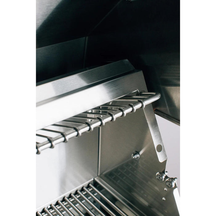 Close-up of American Made Grills Alturi warming rack adjustment system above stainless steel cooking grates