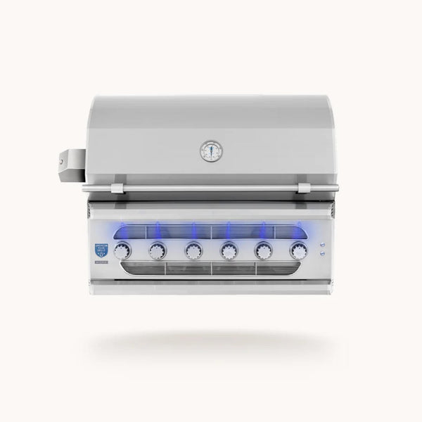 American Made Grills Muscle 42-inch built-in hybrid grill with six control knobs, stainless steel construction, temperature gauge, and LED lighting.