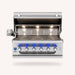 American Made Grills Muscle 42-inch built-in hybrid grill with open hood, stainless steel cooking grates, rotisserie system, interior lights, and six control knobs.