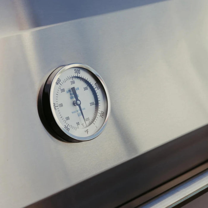 American Made Grills Muscle hybrid grill hood with built-in analog temperature gauge for convenient heat monitoring.