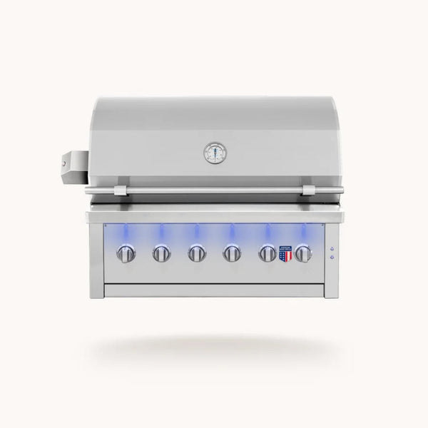 American Made Grills Ovation 42-inch hybrid built-in grill with stainless steel construction, six control knobs, hood thermometer, and LED lighting.