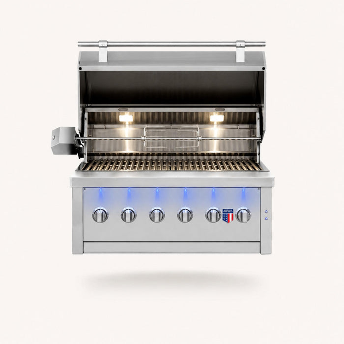 American Made Grills Ovation 42-inch hybrid built-in grill with open hood, stainless steel cooking grates, rotisserie, interior lights, and LED controls.