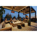 Bromic Platinum Smart-Heat outdoor radiant heaters mounted beneath a modern covered patio, providing warmth for outdoor dining and lounge seating.