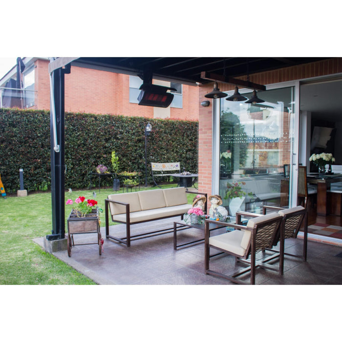 Bromic Tungsten Smart-Heat black gas patio heater ceiling-mounted above a covered residential patio seating area