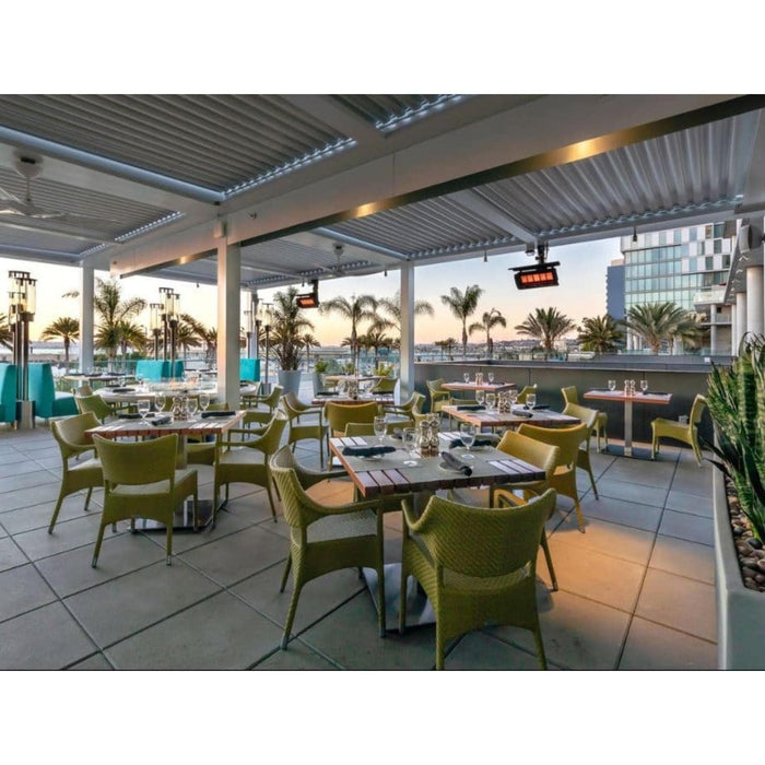 Bromic Tungsten Smart-Heat ceiling-mounted gas patio heaters installed above an upscale outdoor restaurant dining terrace