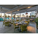 Bromic Tungsten Smart-Heat ceiling-mounted gas patio heaters installed above an upscale outdoor restaurant dining terrace