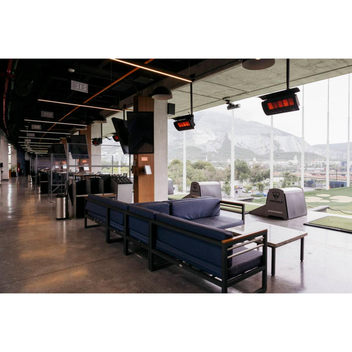 Bromic Tungsten Smart-Heat gas radiant patio heaters ceiling-mounted above lounge seating at a commercial golf entertainment venue