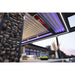 Bromic Platinum electric patio heater recessed into a modern pergola ceiling above an outdoor kitchen and entertaining area