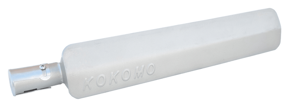 Close-up of a durable cast stainless steel grill burner with precision engineering, designed for even heat distribution and showcasing KoKoMo logo