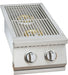 Stainless steel outdoor kitchen side burner featuring two brass burners with control knobs, protective grate, and polished design