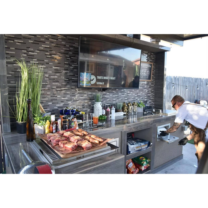 Kokomo Grills built-in paper towel holder installed in an outdoor kitchen BBQ island