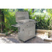 Le Griddle GFCART75 portable griddle cart with compatible gas griddle and lid installed on a landscaped backyard patio.