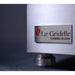 Close-up of Le Griddle Commercial Series branding badge on brushed stainless steel housing of 30-inch gas griddle