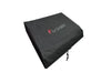 Black outdoor griddle cover with drawstring closure, durable weather-resistant fabric for protecting cooking equipment outdoors.
