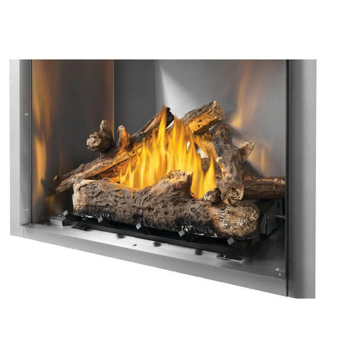Napoleon Riverside 36-inch outdoor gas fireplace with split oak logs, reflective interior panels, and realistic flame display.