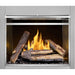 Napoleon Riverside 42 single-sided outdoor natural gas fireplace with realistic oak logs, burning flames, and dark interior panels.