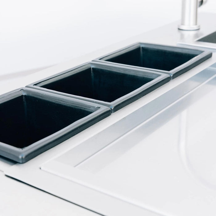 Three removable condiment containers on Summerset outdoor beverage and prep station