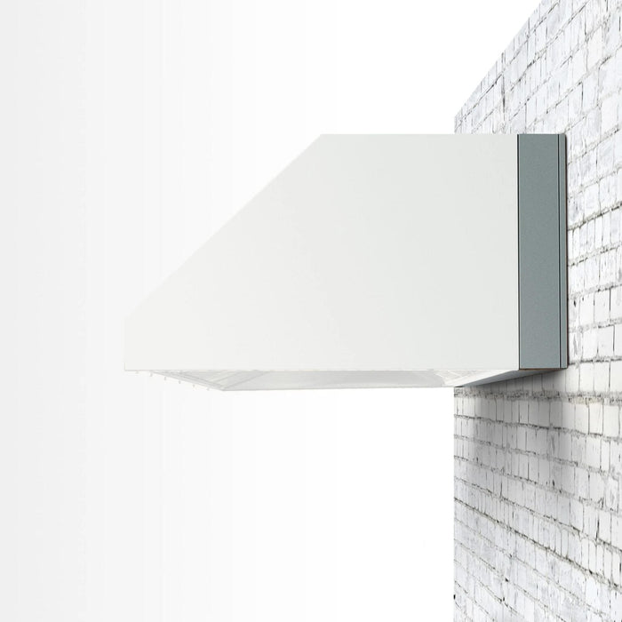 Summerset 4-inch spacer bracket installed between a 60-inch outdoor vent hood and wall