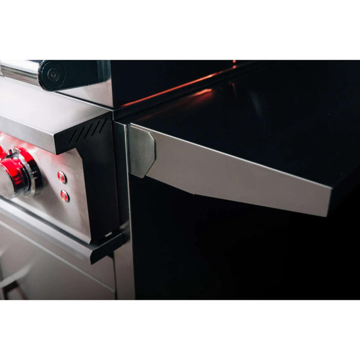 Close-up of TrueFlame stainless steel grill cart fold-down side shelf and hinge design.