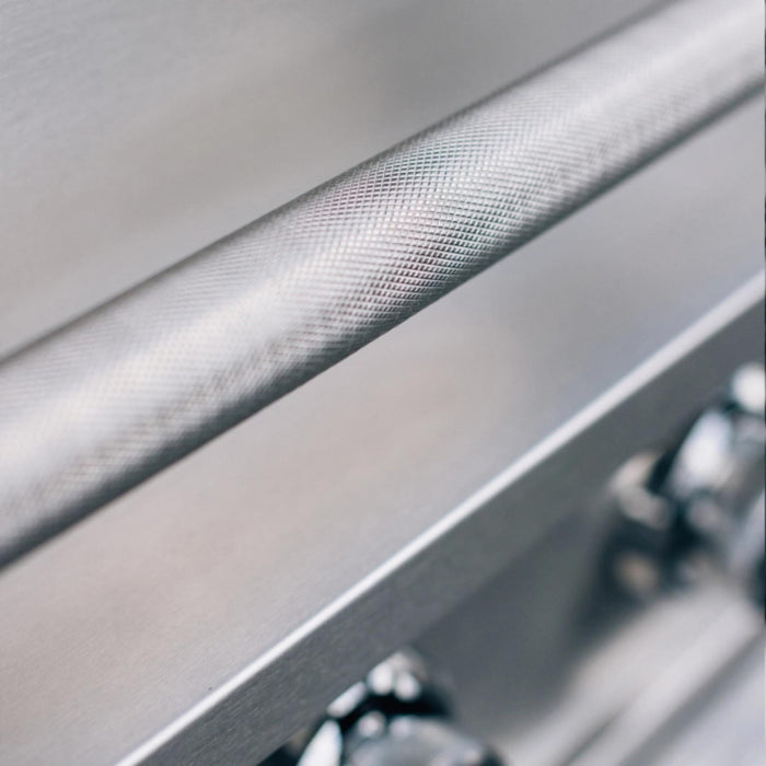 Close-up of the TrueFlame E-Series built-in gas grill knurled stainless steel hood handle.