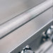Close-up of the TrueFlame E-Series built-in gas grill knurled stainless steel hood handle.
