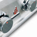 Close-up of the TrueFlame 25" E-Series built-in gas grill stainless steel control knobs and TrueFlame logo.
