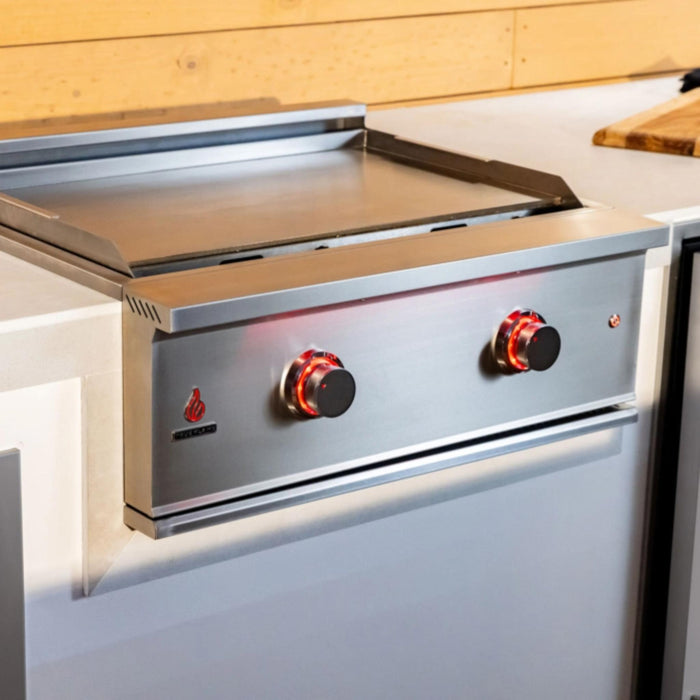 TrueFlame 30-inch built-in gas griddle in outdoor kitchen showing stainless steel flat-top cooking surface and LED controls