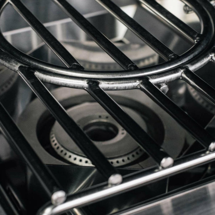 Close-up of the TrueFlame power burner removable wok grate and cast stainless steel ring burner.