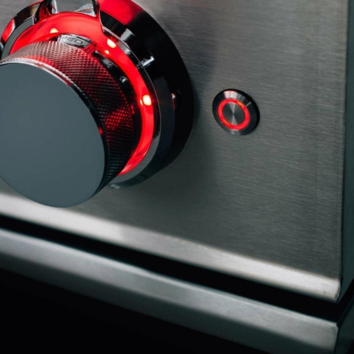 Close-up of TrueFlame Double Side Burner LED control knob and illuminated power button
