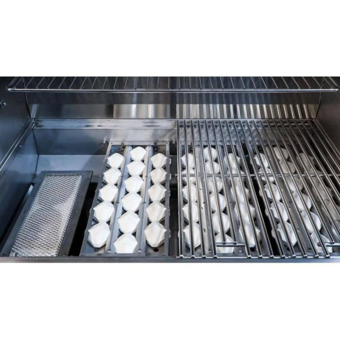 Close-up of Wildfire Ember built-in gas grill cooking surface with infrared sear burner, ceramic briquette heat system, and stainless steel grates